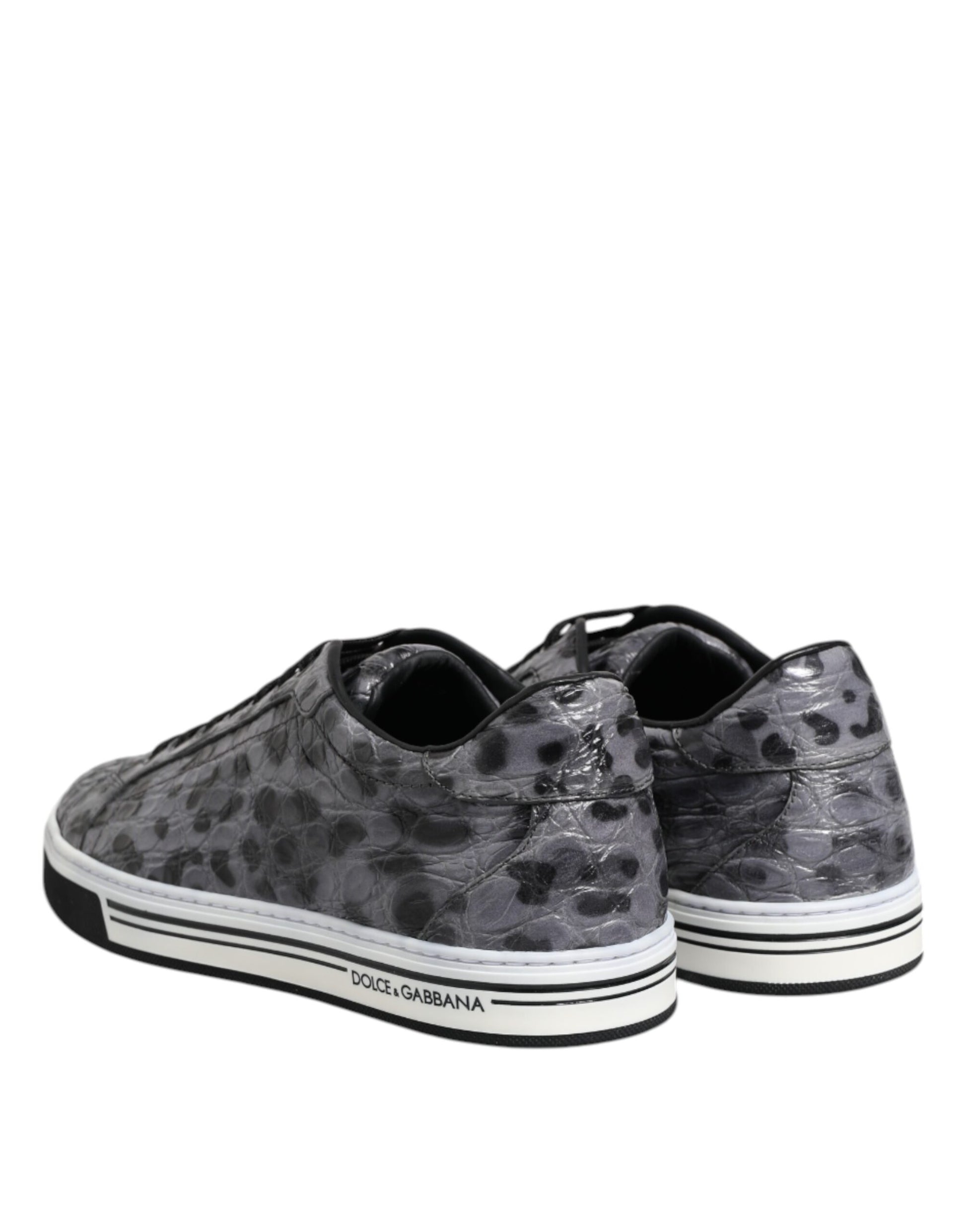 Pair of gray leopard print sneakers with white soles and laces, featuring the Dolce & Gabbana logo