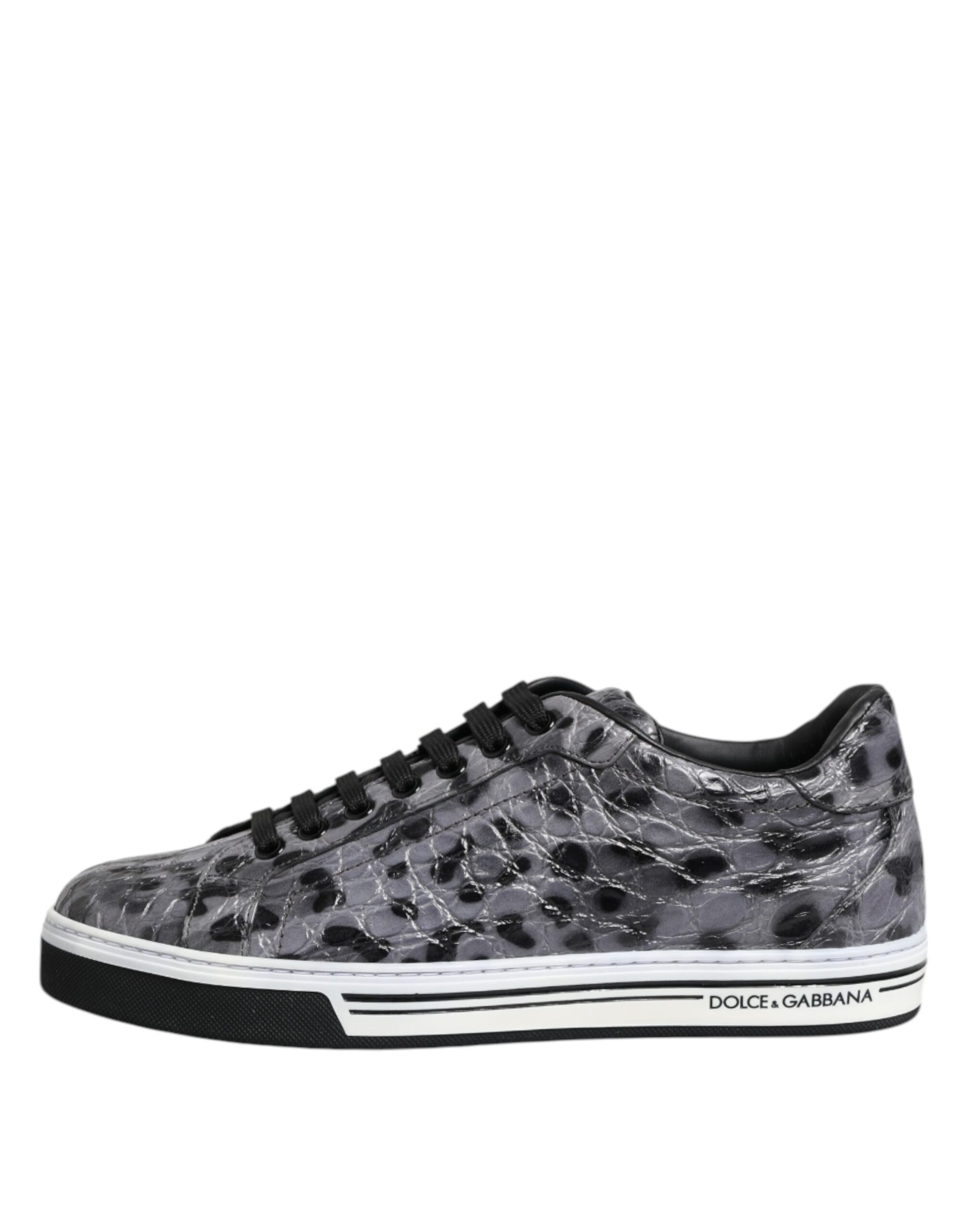 A pair of gray leather sneakers with a leopard print pattern on the side
