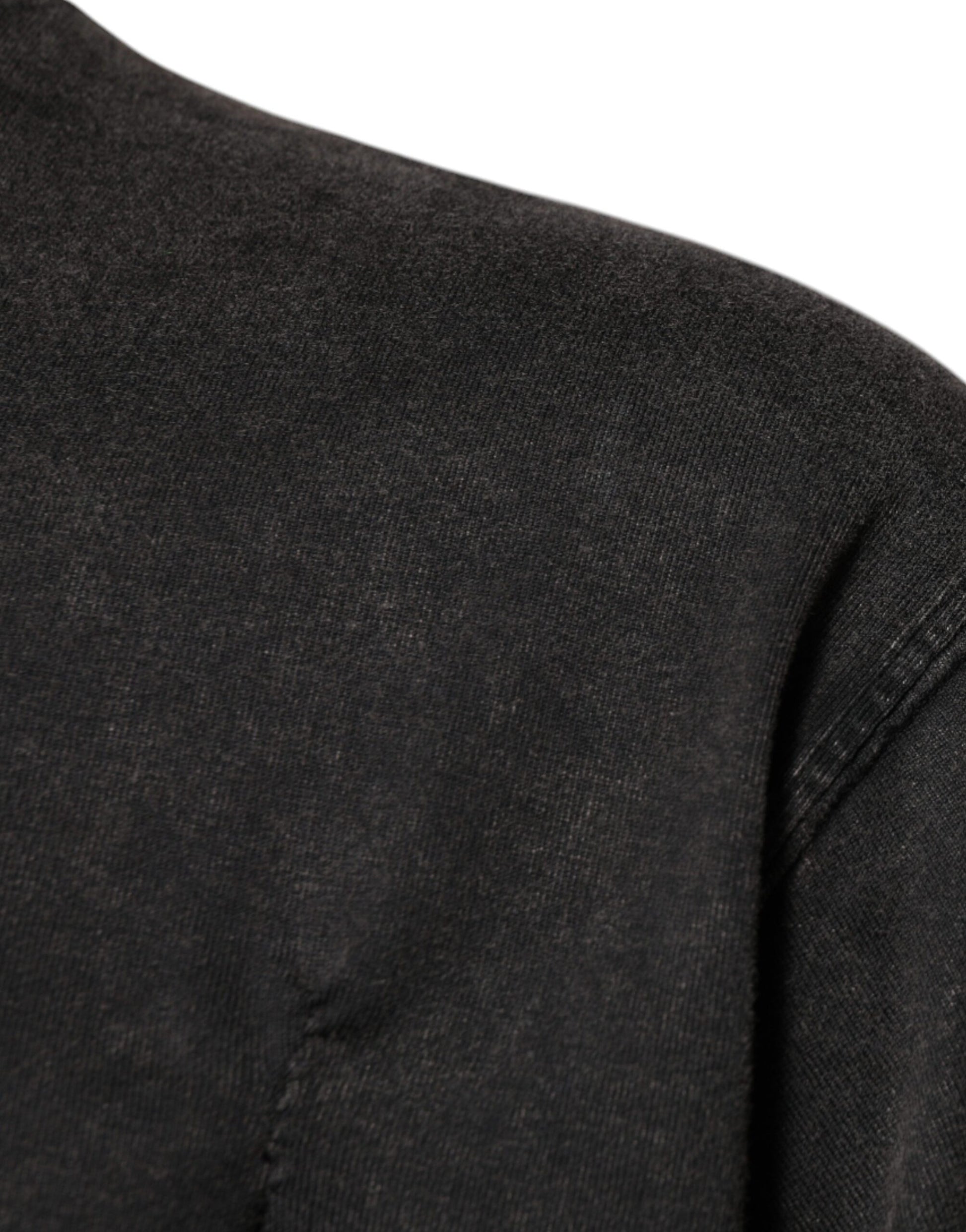 Dark fabric garment with visible stitching details