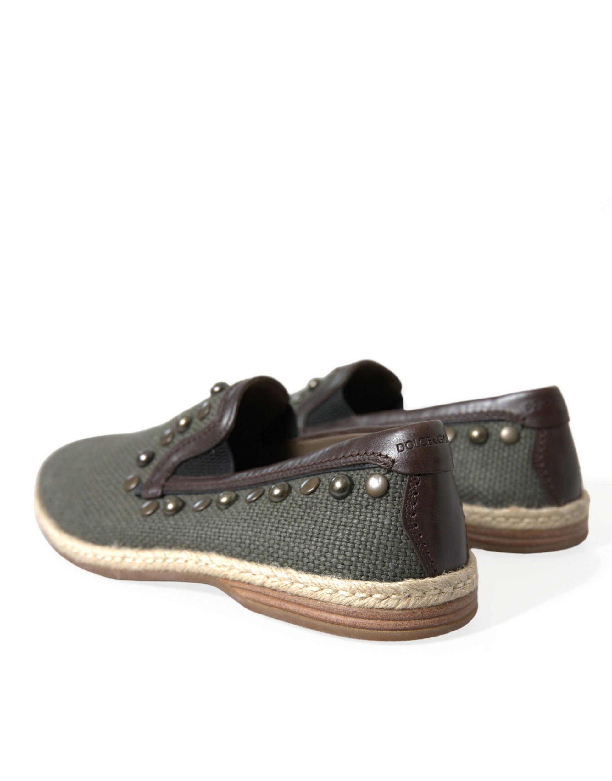 Pair of brown shoes with tan soles and black laces
