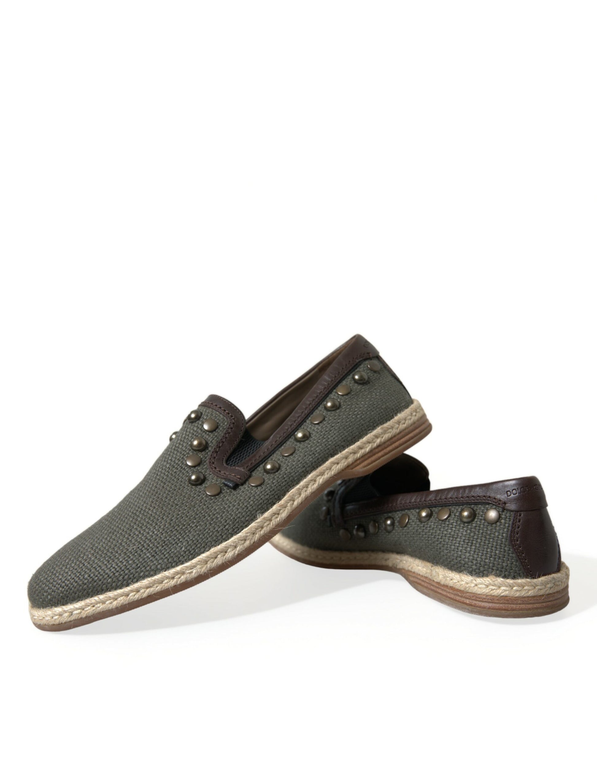 Pair of brown shoes with tan soles and black laces