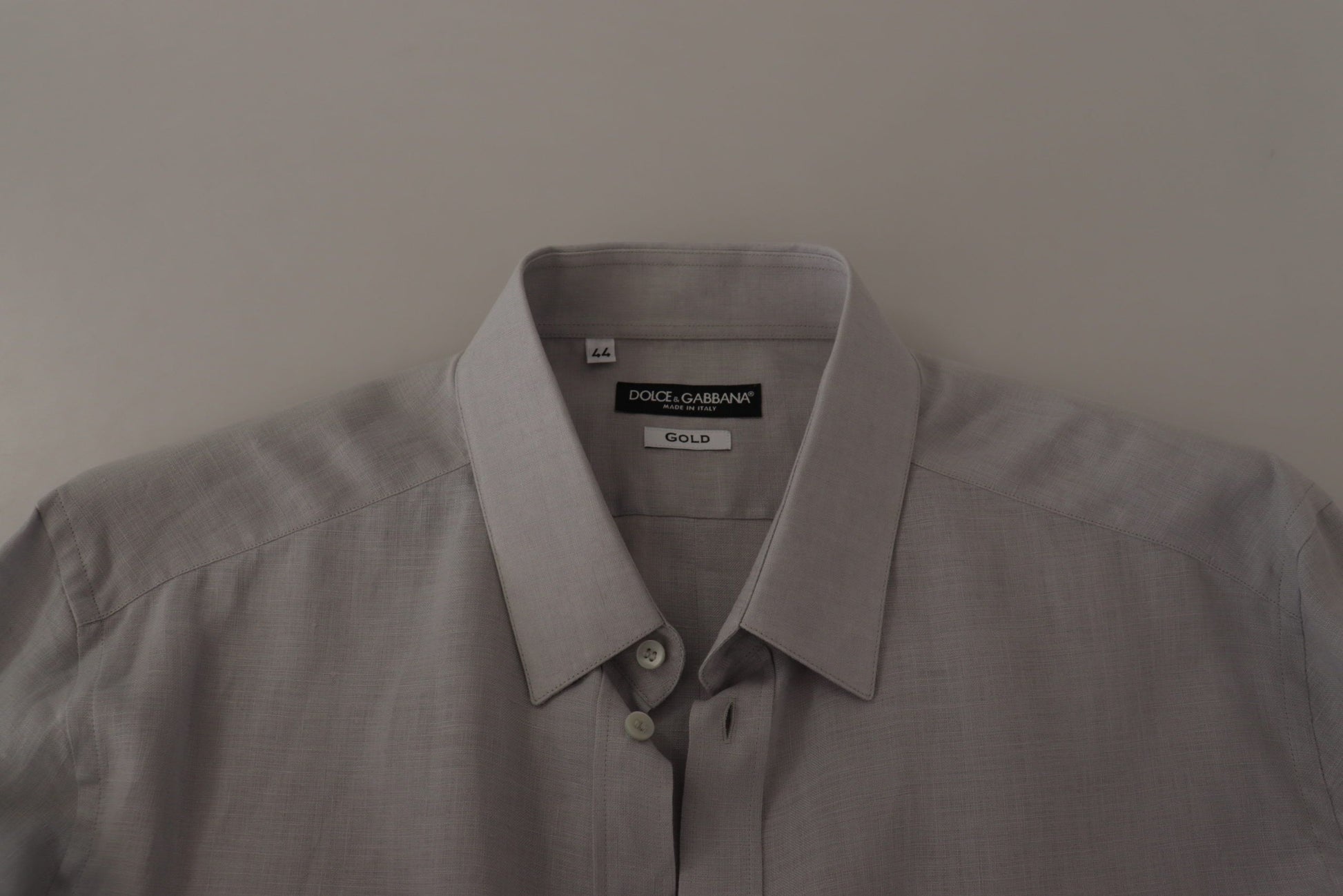 Men's button down shirt on hanger