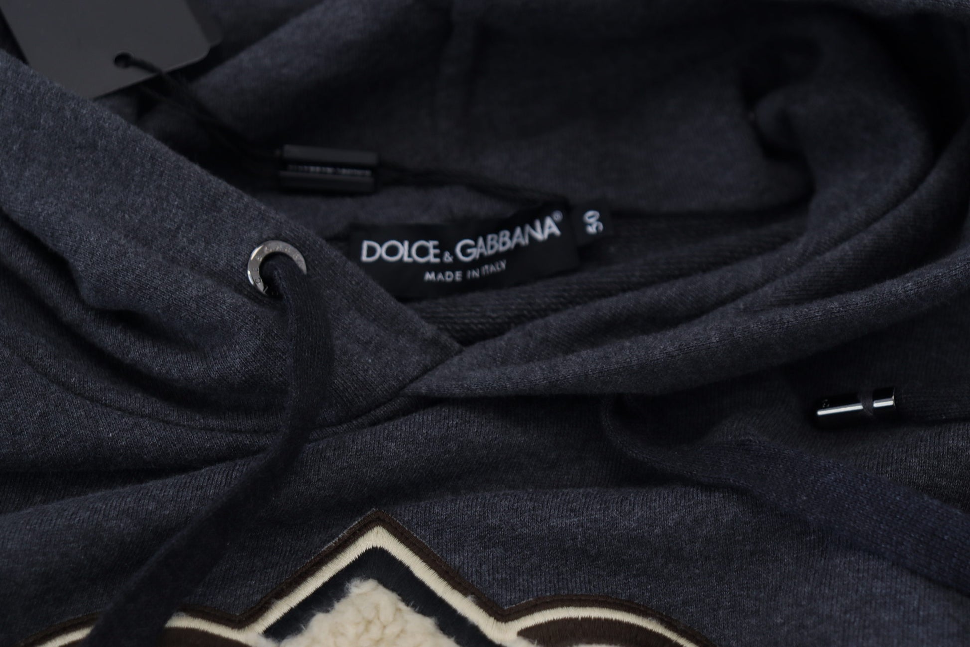 Black hoodie on a hanger