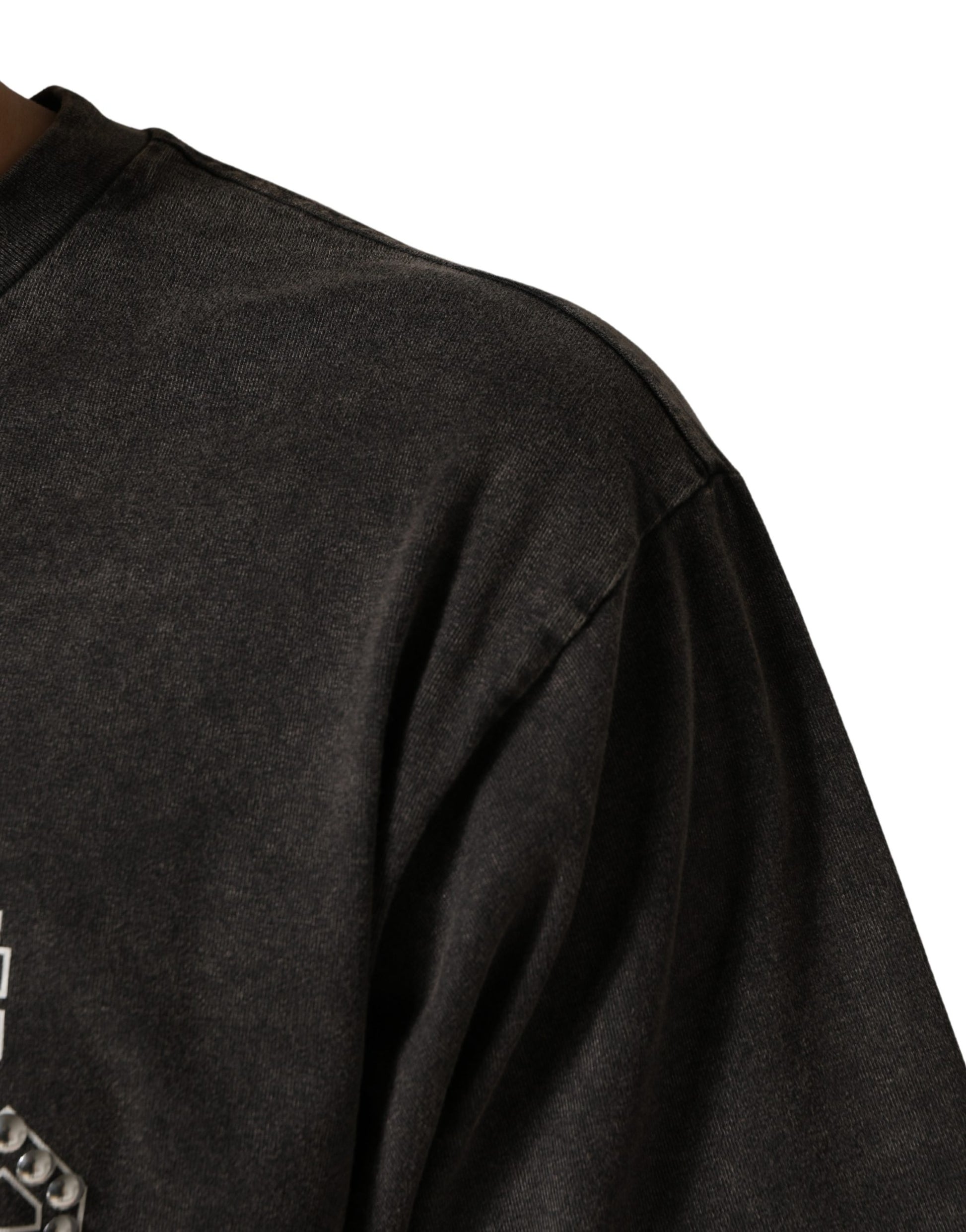 Black long sleeve shirt on a person's arm