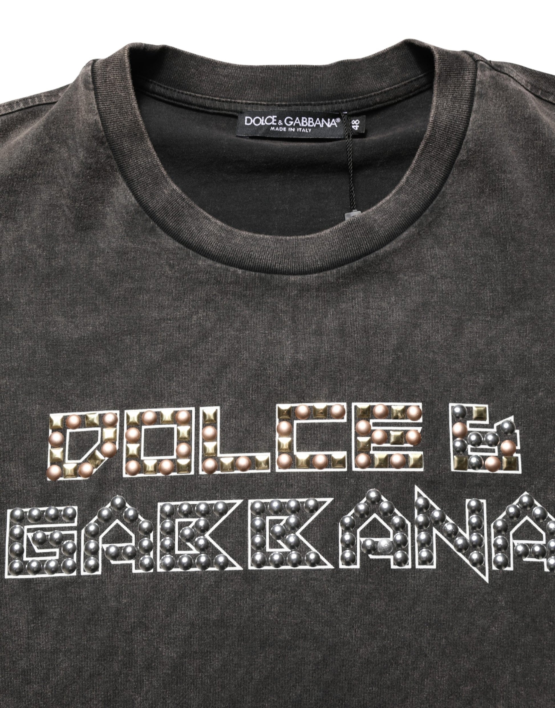 Black t-shirt with white embroidered text