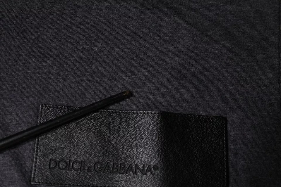 Black pen on top of black wallet