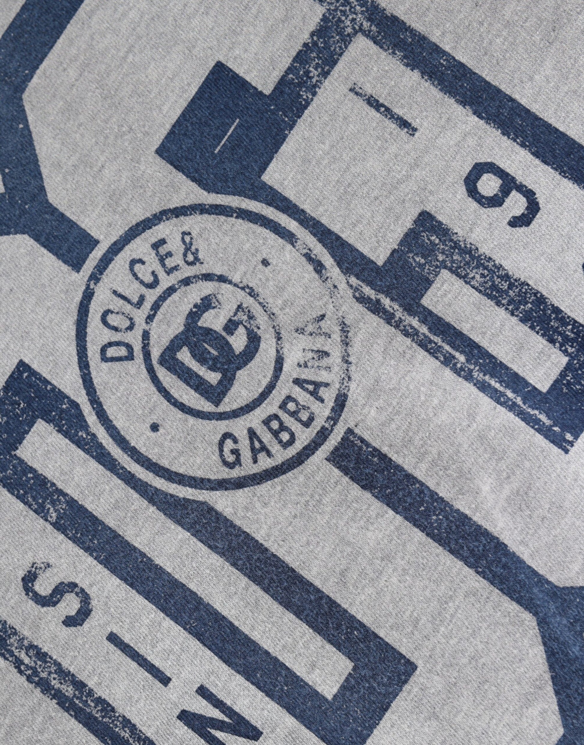 Blue and white towel with embroidered logo