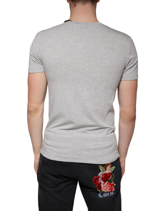 Grey short sleeve shirt with floral design on back