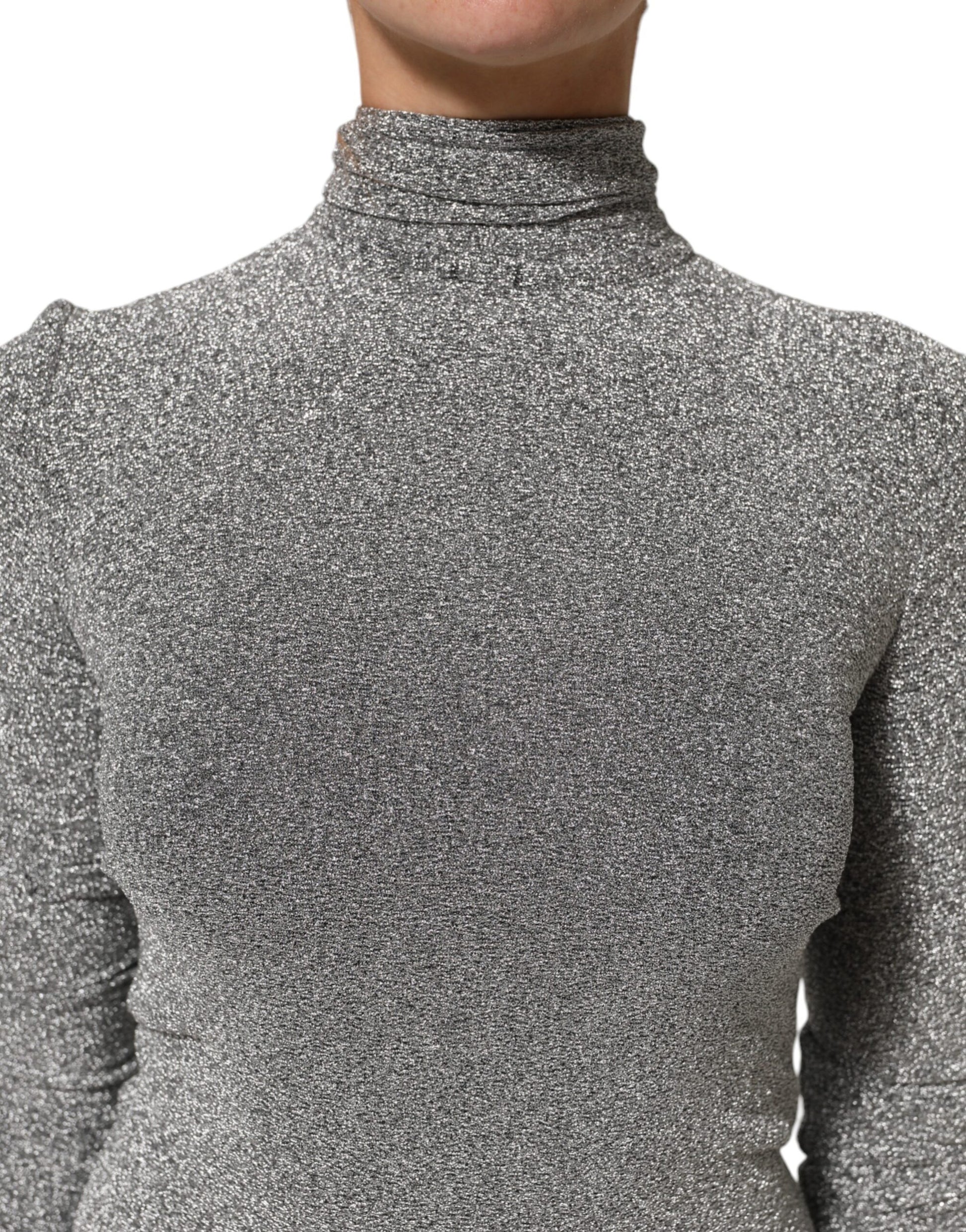 A gray nylon bodycon sheath dress with long sleeves