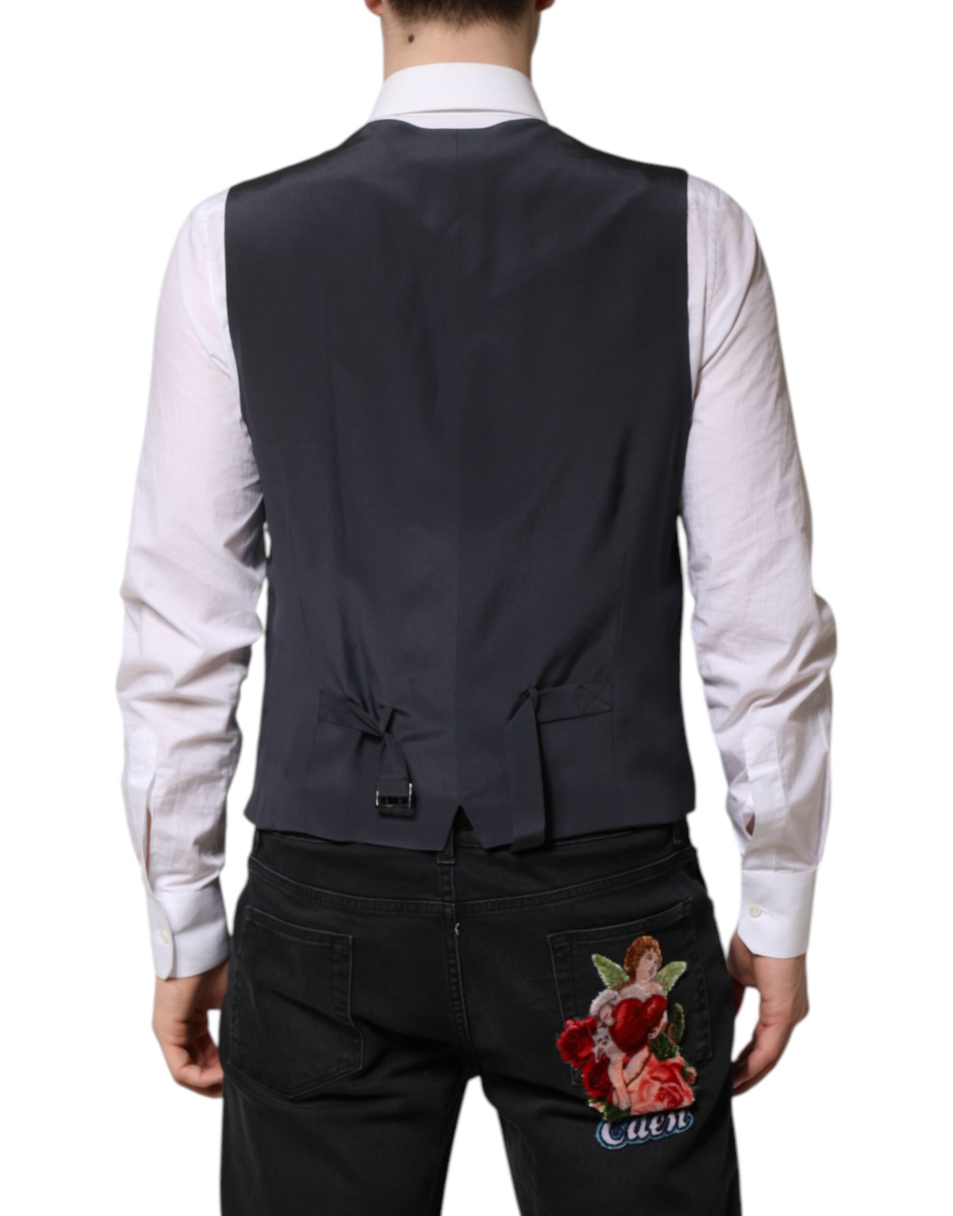 A gray plaid wool vest with a lapel and two pockets