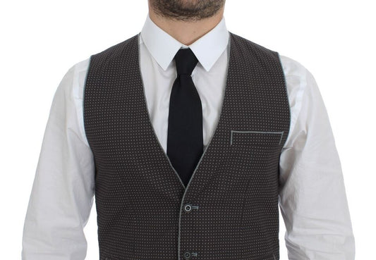 A gray vest with polka dots, part of a suit and tailoring collection