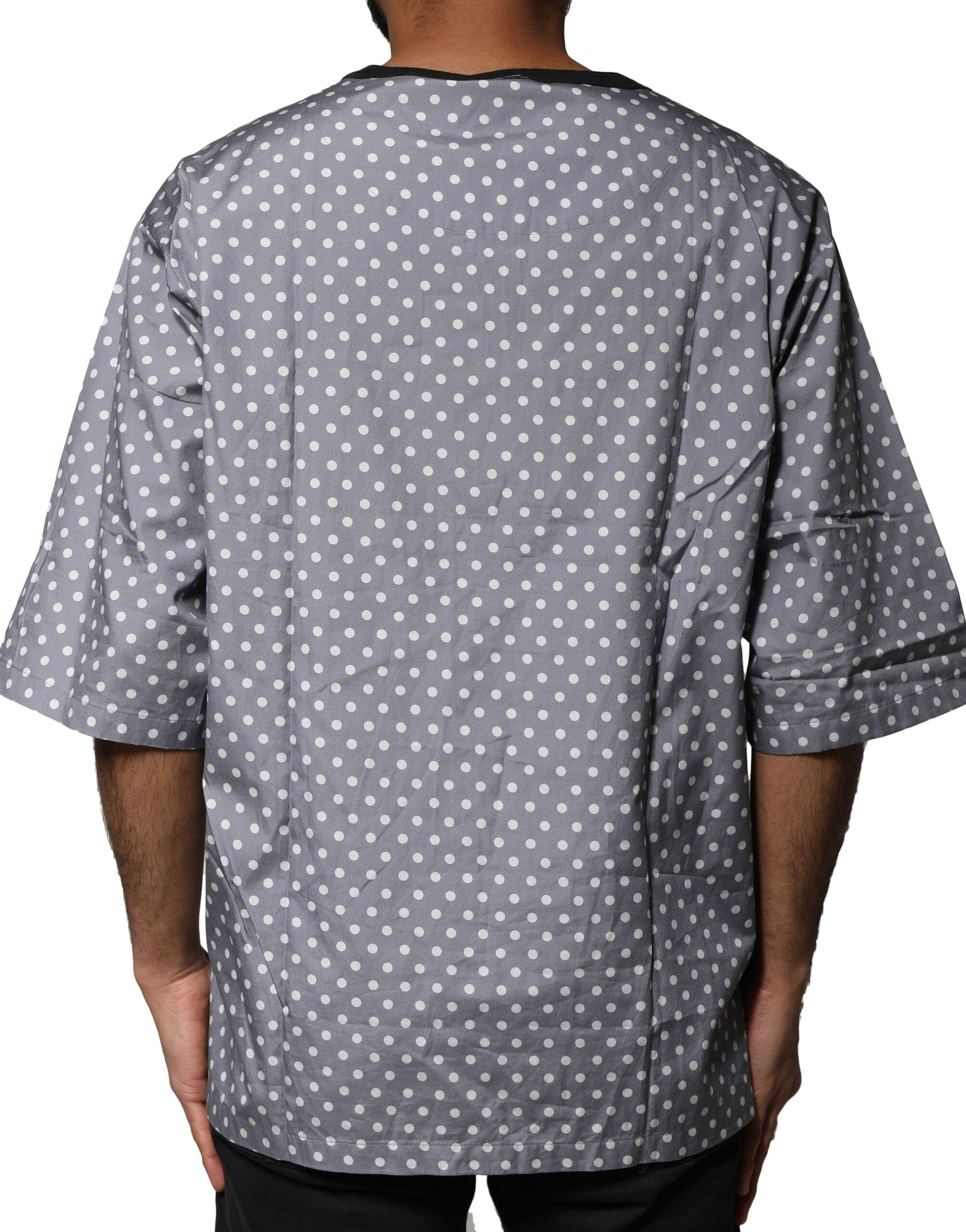 Back view of a long sleeve shirt with polka dots