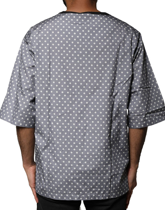 Back view of a long sleeve shirt with polka dots