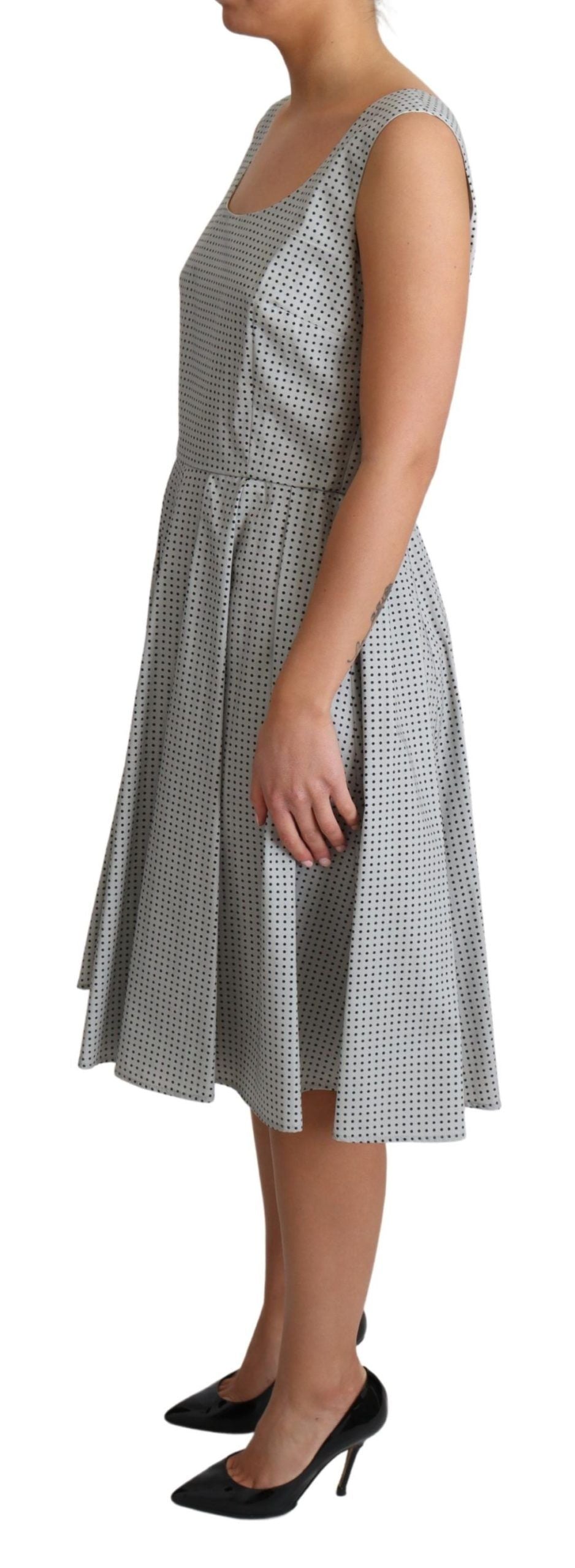 A gray polka dotted cotton dress with an A-line silhouette
