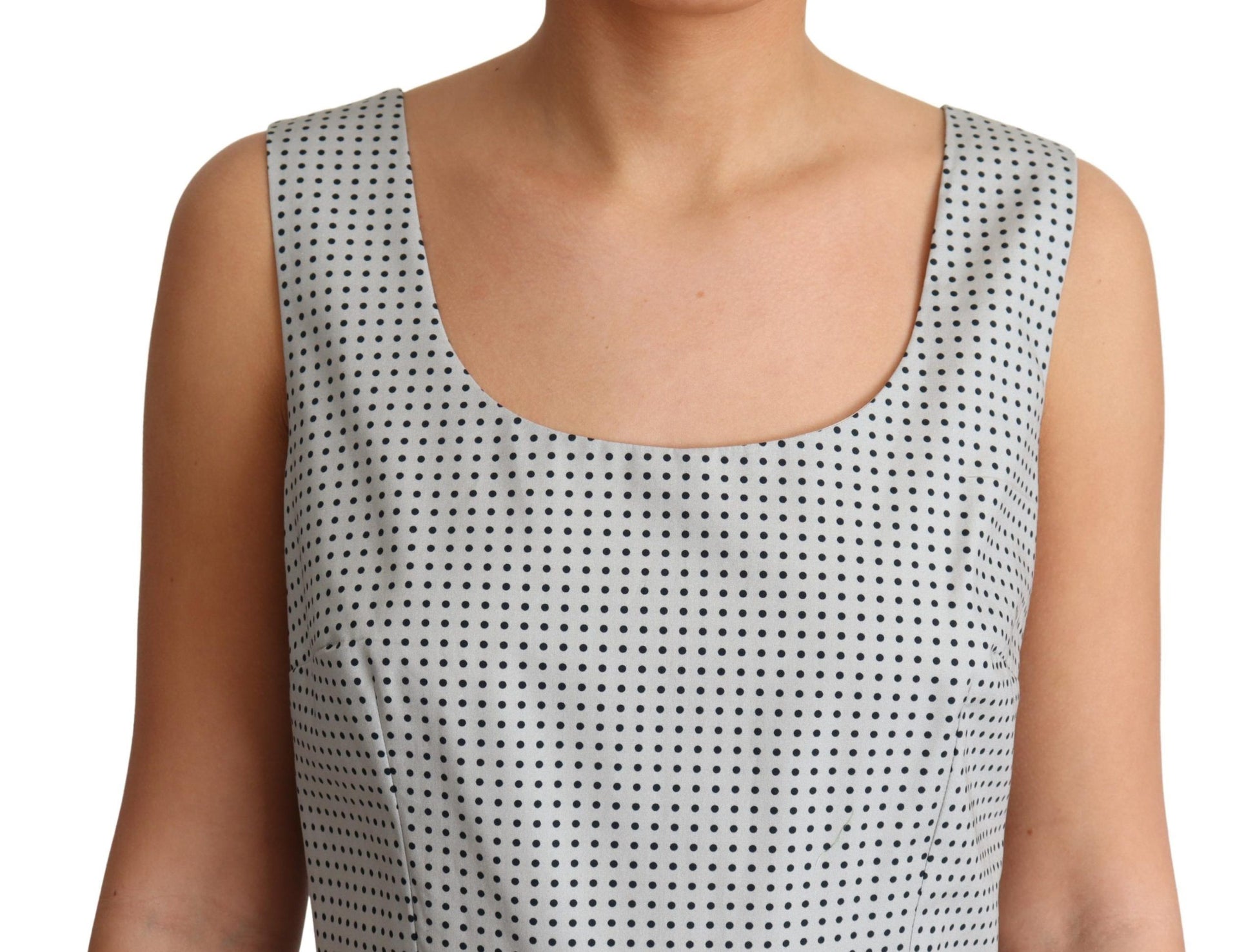 A gray polka dotted cotton dress with an A-line silhouette