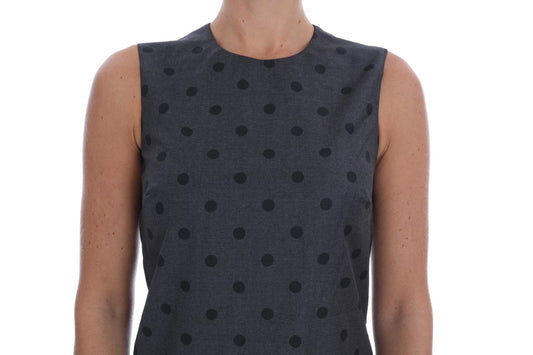 A gray polka dotted sheath wool dress with short sleeves