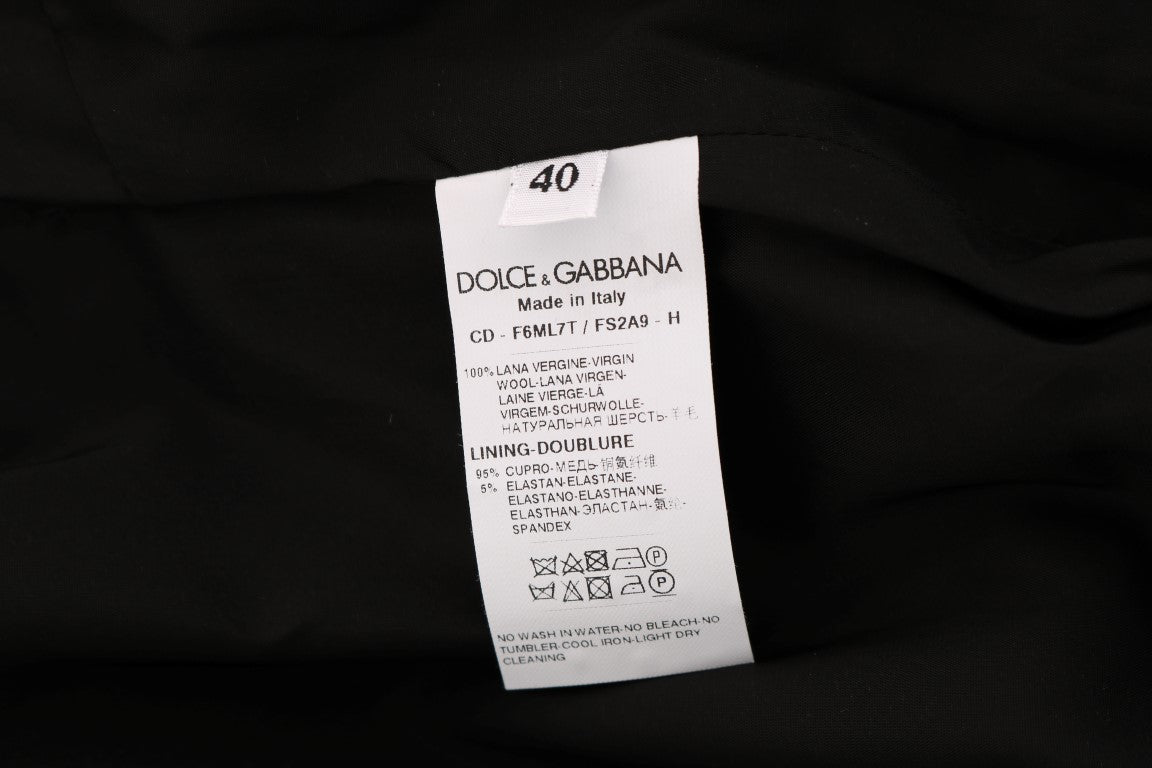 A gray polka dotted sheath wool dress from Dolce & Gabbana