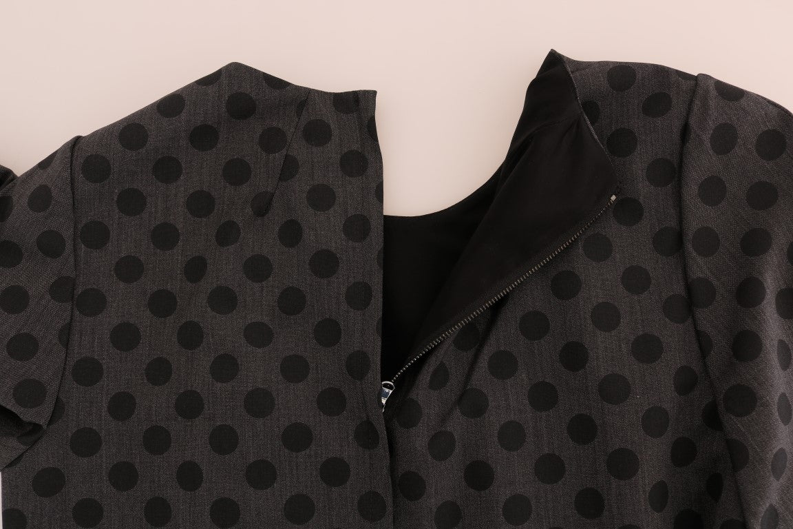 A gray polka dotted wool stretch dress by Dolce & Gabbana