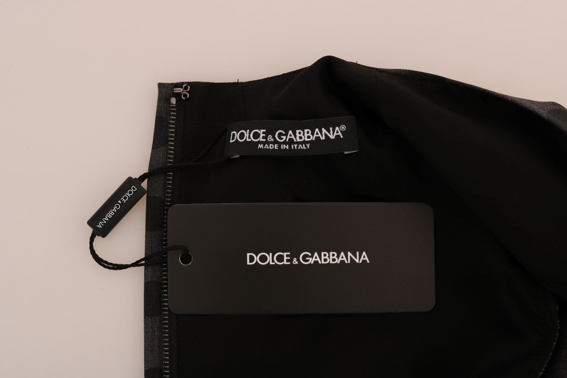 Black dress with gray polka dots, tagged as Dolce & Gabbana, wool stretch material