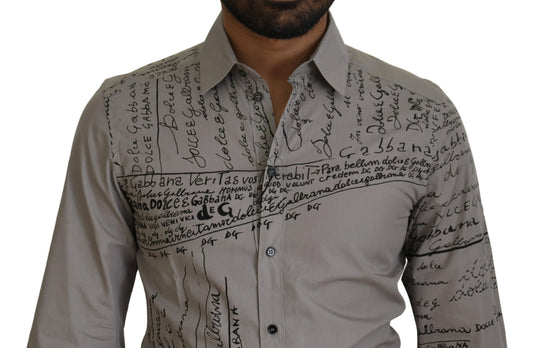 A mannequin wearing a gray shirt with printed text and gold accents