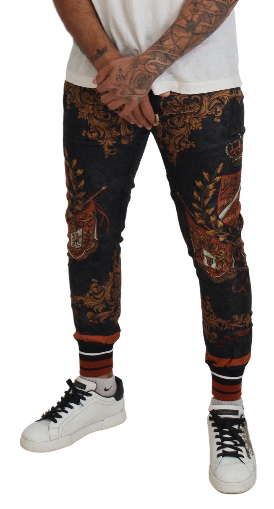 Man wearing patterned pants and sneakers