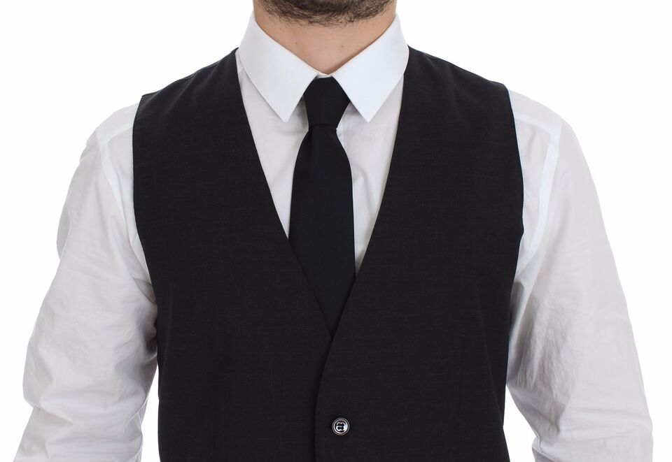 A gray slim fit vest with a button front, part of the formal wear collection by Dolce & Gabbana