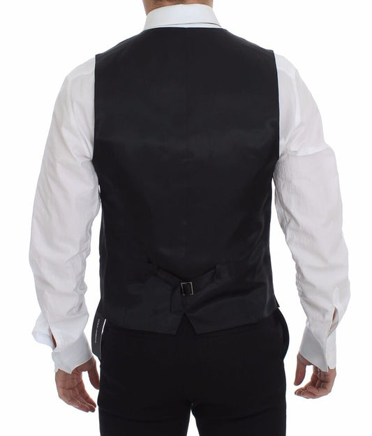 A gray slim fit vest with a button front, part of the formal wear collection by Dolce & Gabbana