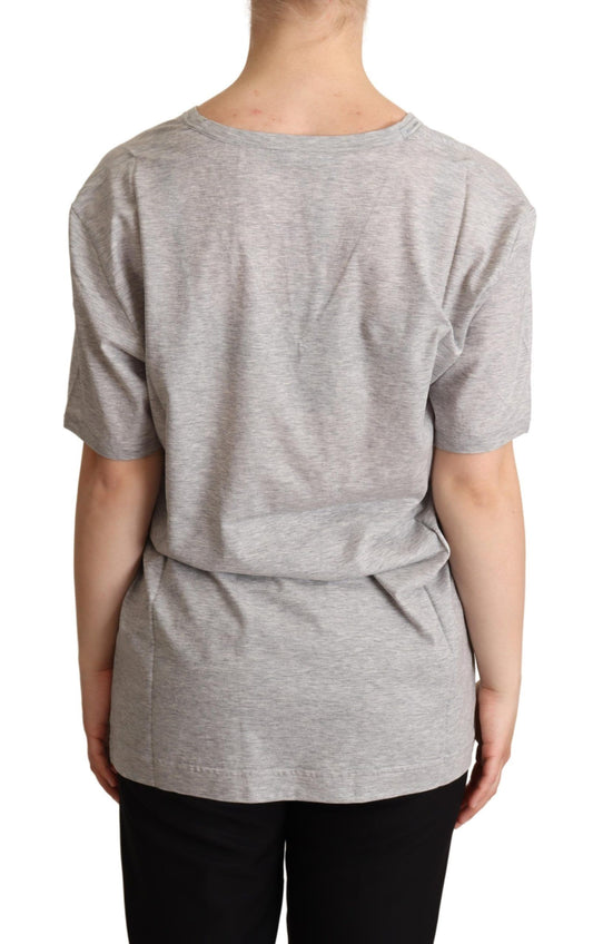 Grey short sleeve shirt on a person from behind
