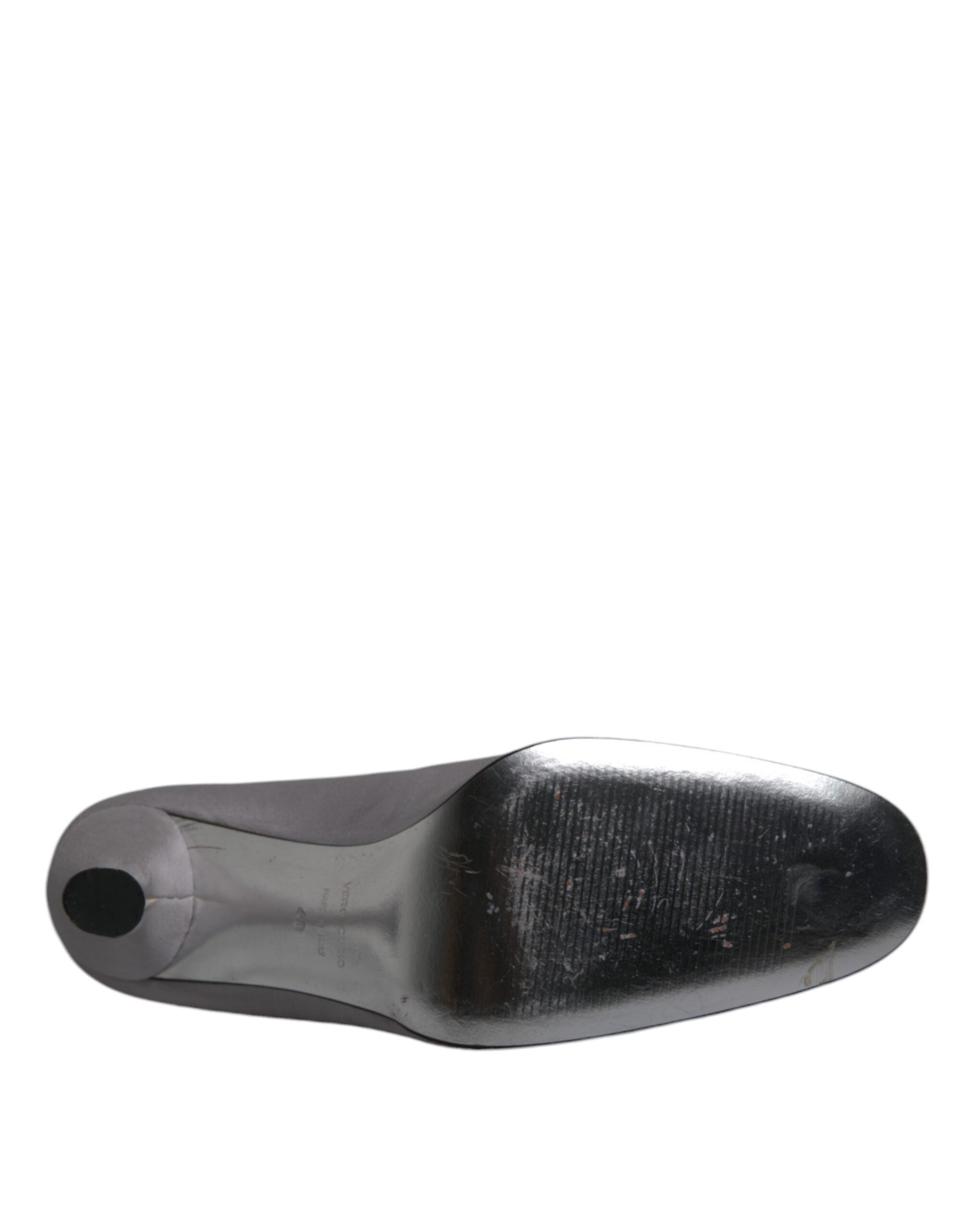 A black shoe sole with a patterned texture on its surface