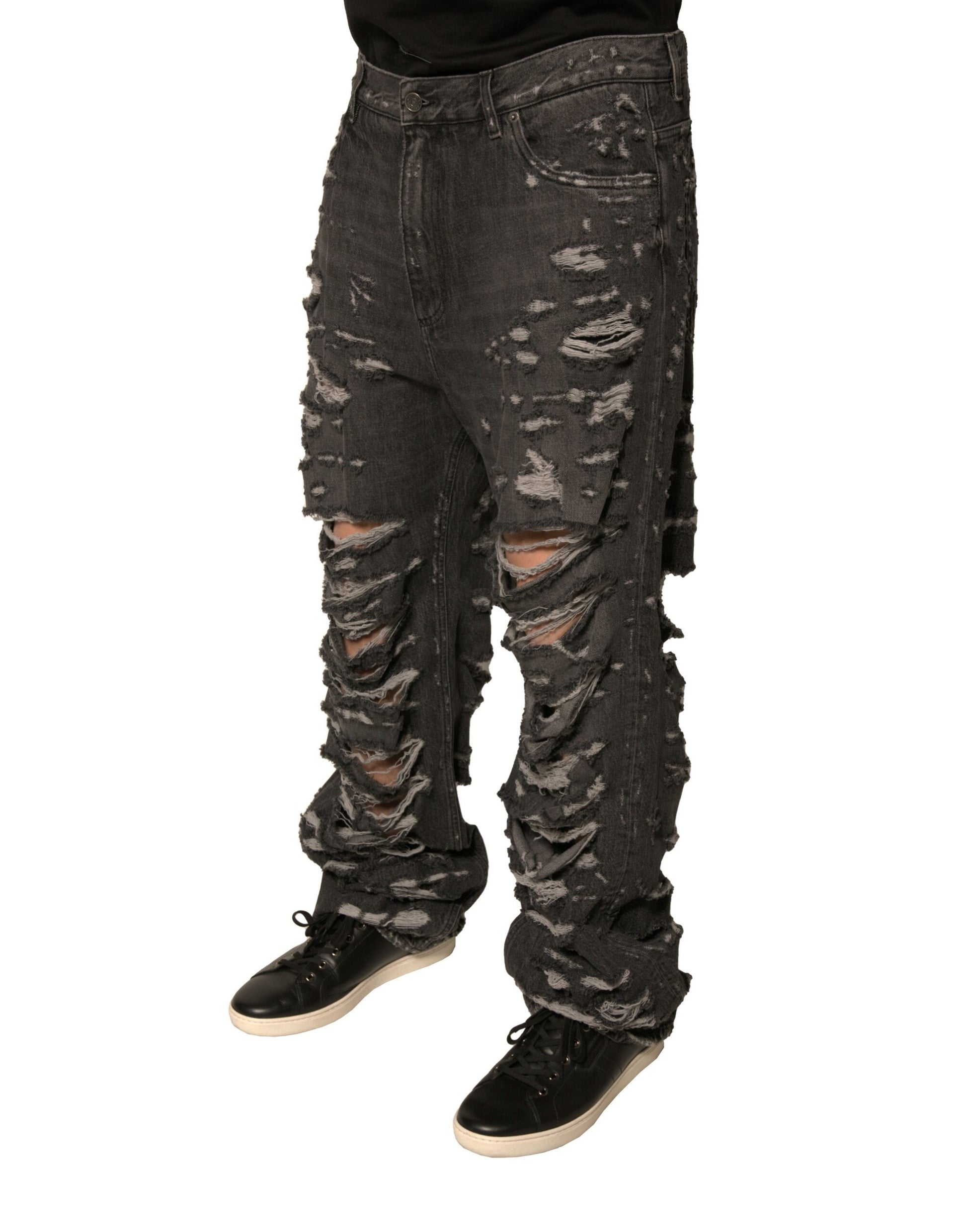 Pair of distressed jeans with rips and tears