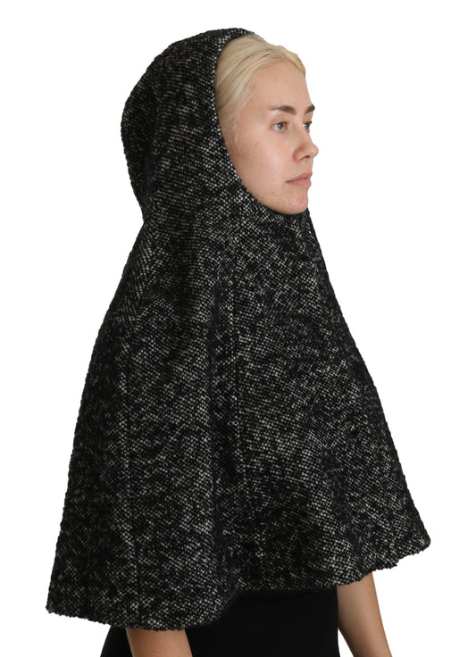 Black head covering worn by woman