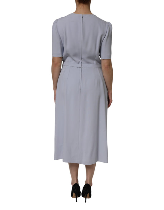 Long sleeved dress with belt at waist