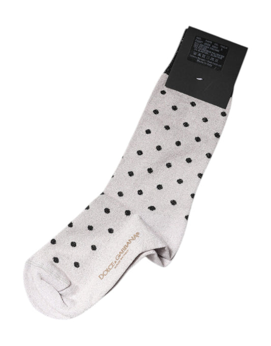 Pair of gray socks with white polka dots