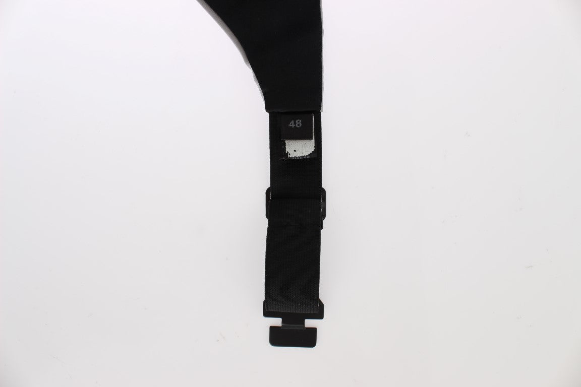 Black strap on white surface