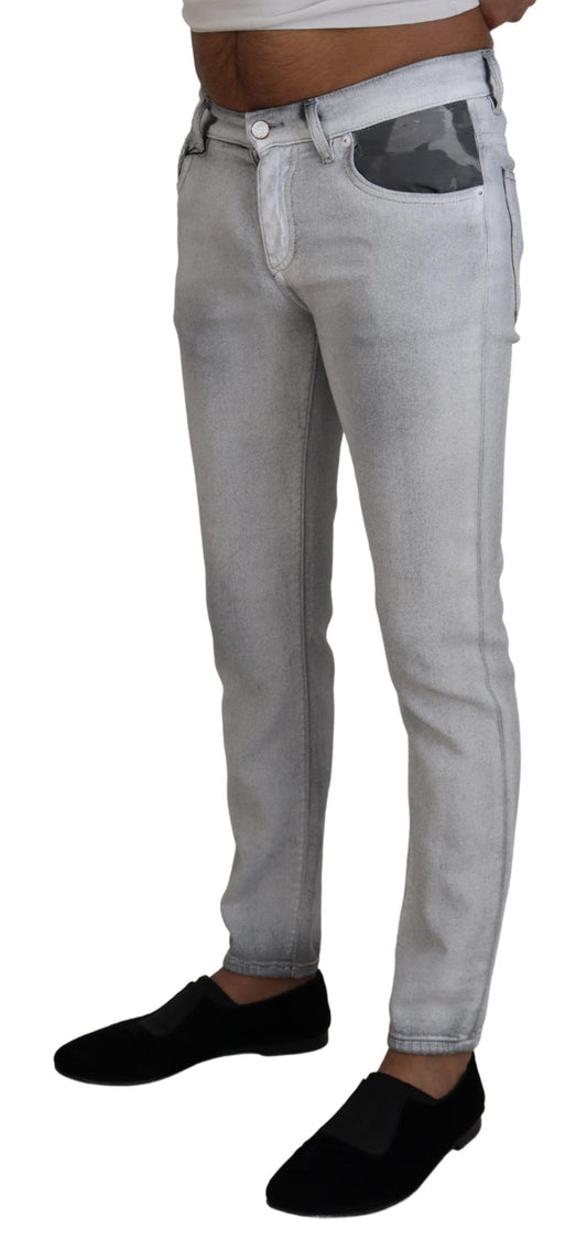 Man wearing blue jeans and black shoes