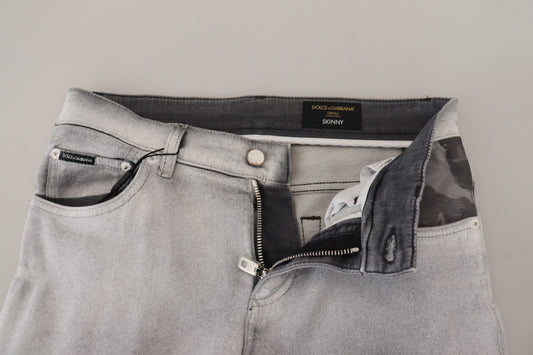Pair of light blue jeans on a hanger