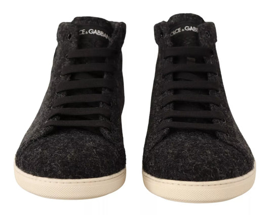 Pair of black sneakers with white soles