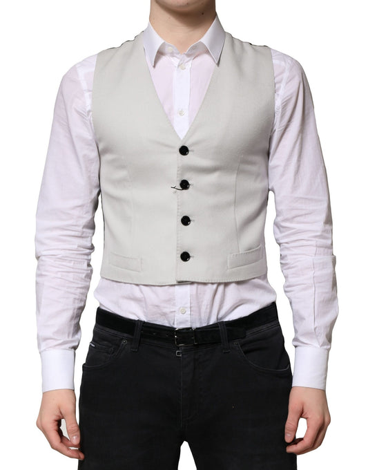 A gray wool vest with black buttons, part of a formal men's suit