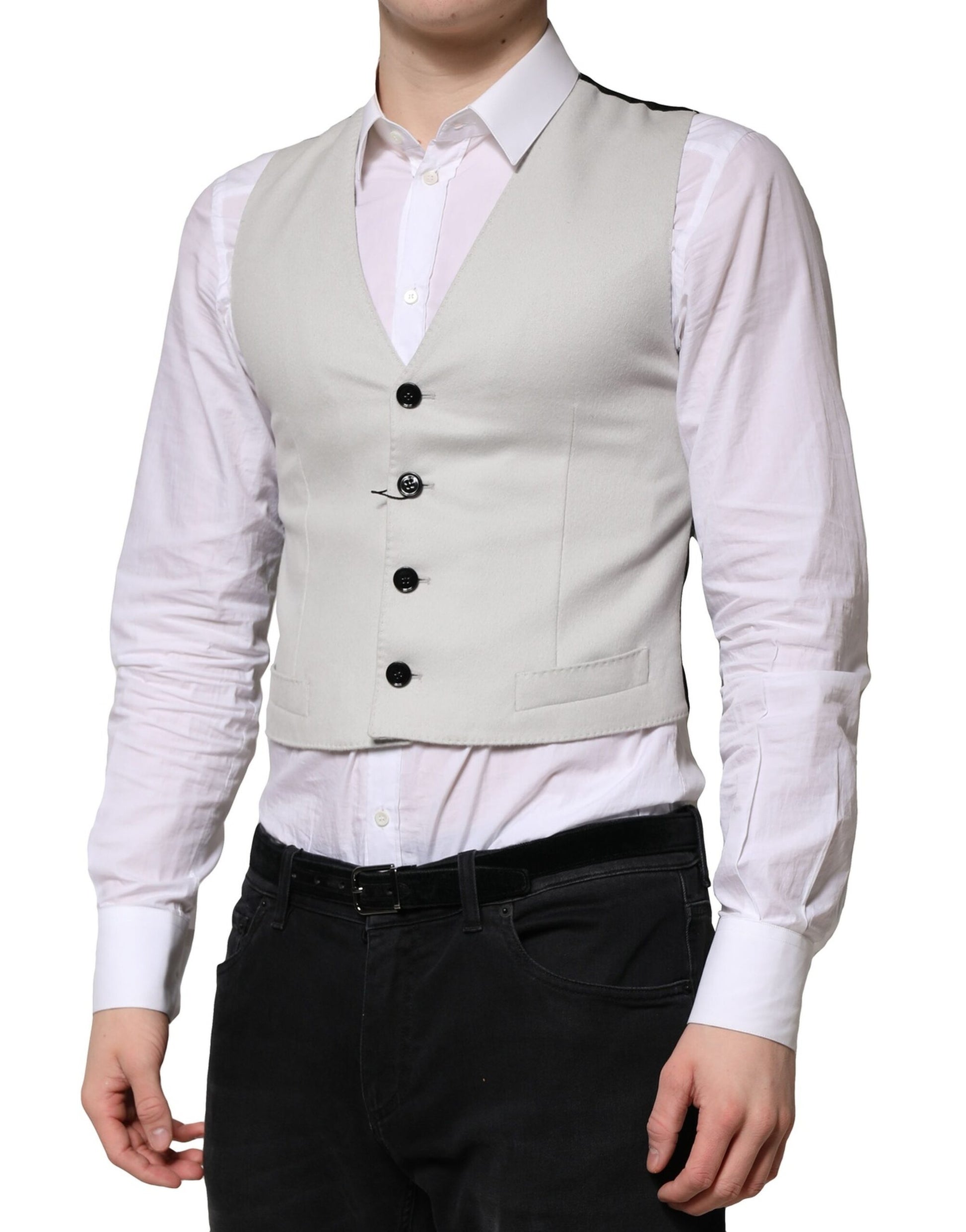 A gray wool vest with black buttons, part of a formal men's suit