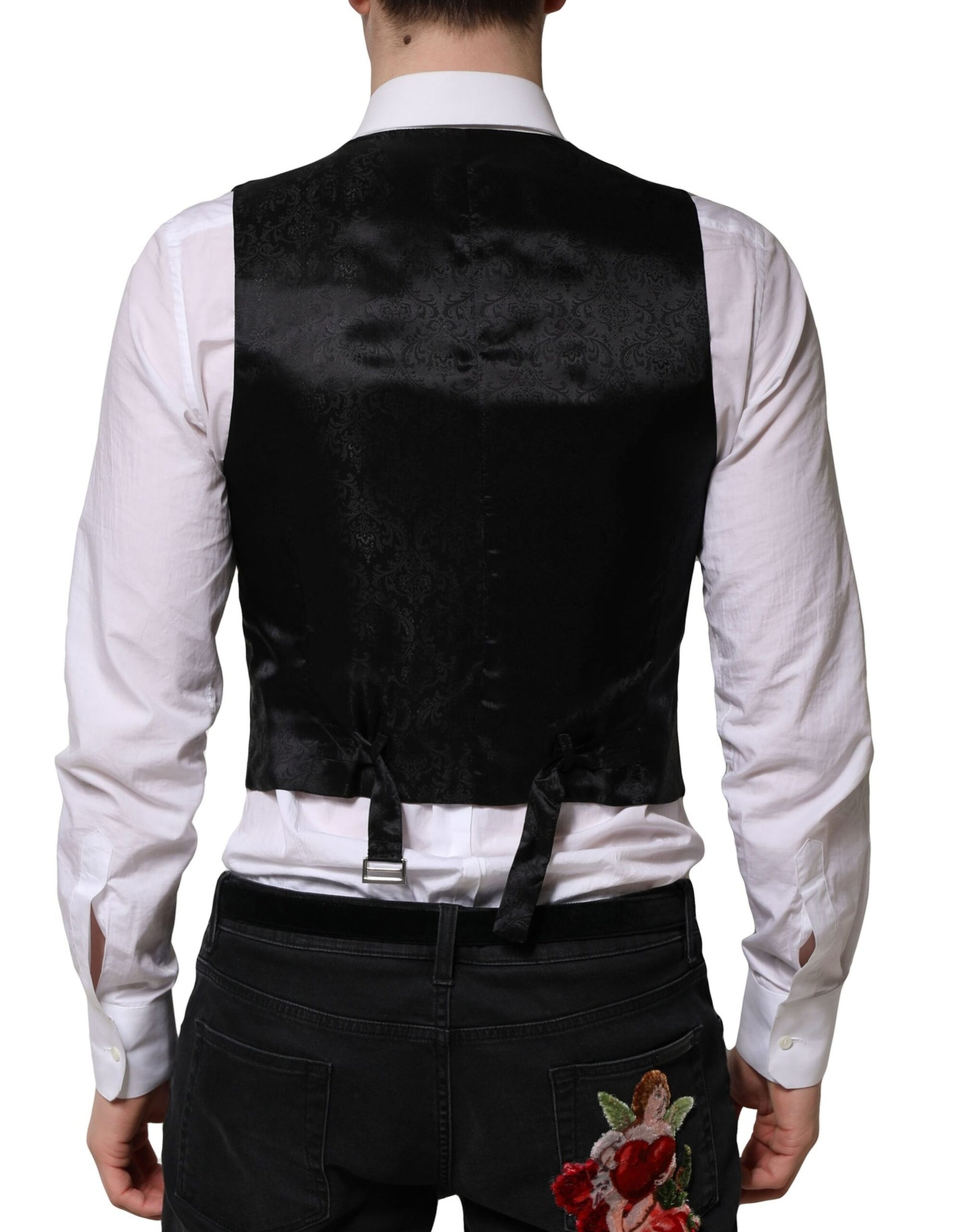 A gray wool vest with a black waistband, part of a formal men's suit