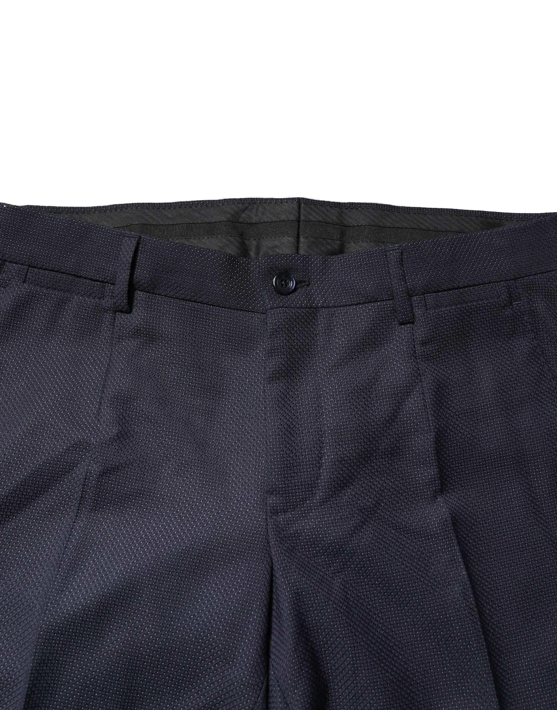 A pair of gray wool formal dress trousers from the brand Dolce & Gabbana. They are designed for men and featu
