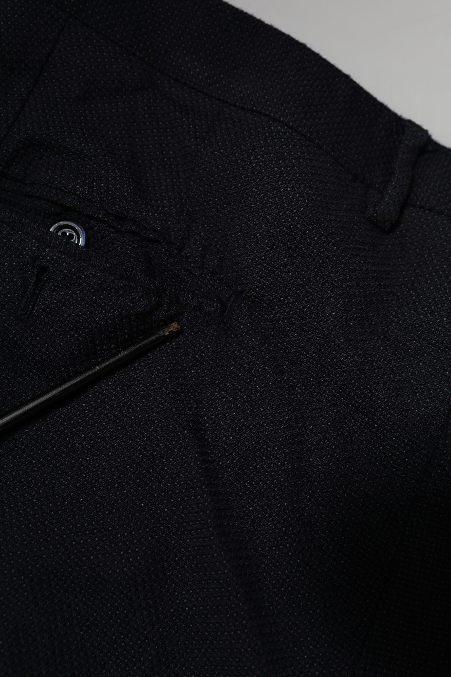 A pair of gray wool formal trousers from the brand Dolce & Gabbana