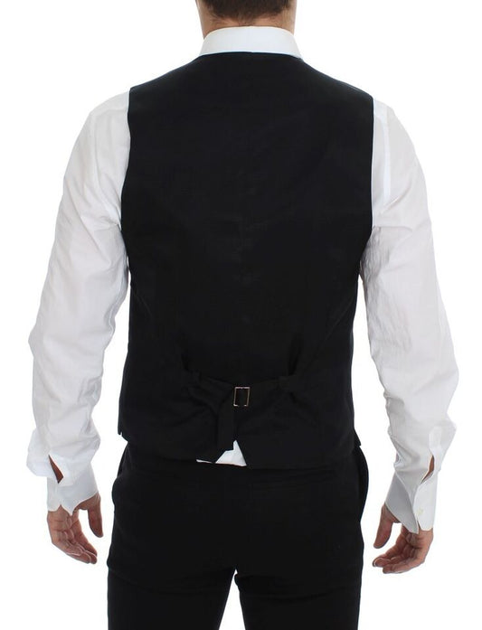 A gray wool vest with a black satin lapel and belt loops