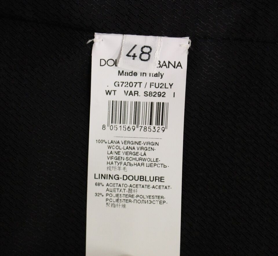 A gray wool vest from Dolce & Gabbana, part of a formal dress suit