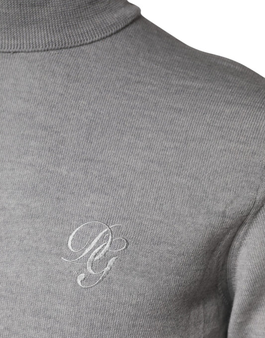 Grey turtleneck sweater with embroidered initials on chest