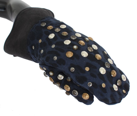 Hand wearing a glove with gold studs