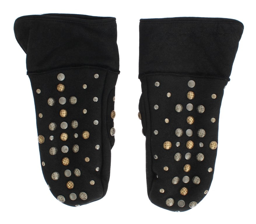 Pair of black boots with gold studs