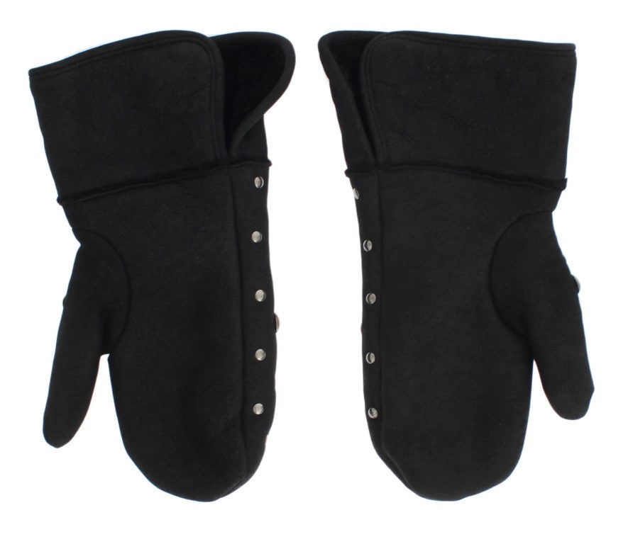 Pair of black gloves with buttons on wrists