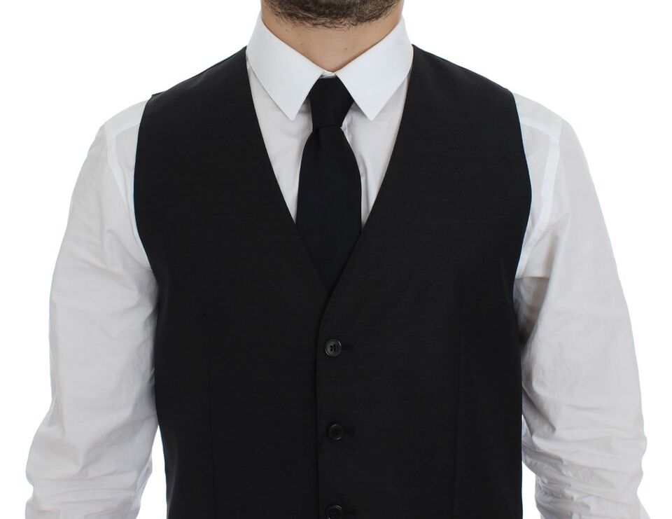 A gray vest with a wool and silk blend, featuring a classic design