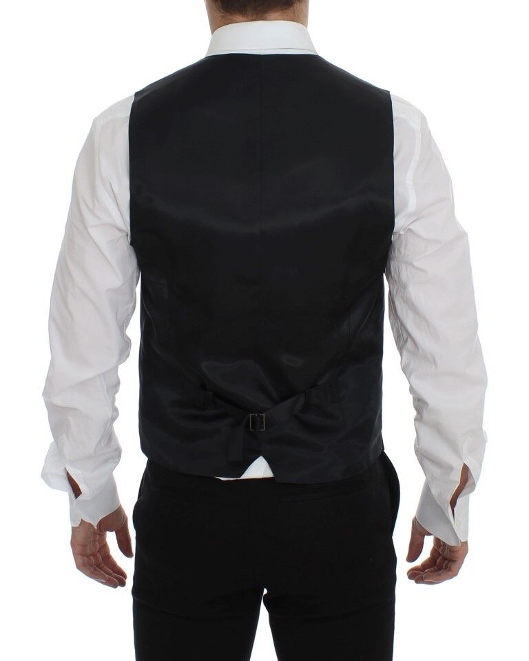 A gray vest with a black and white striped pattern